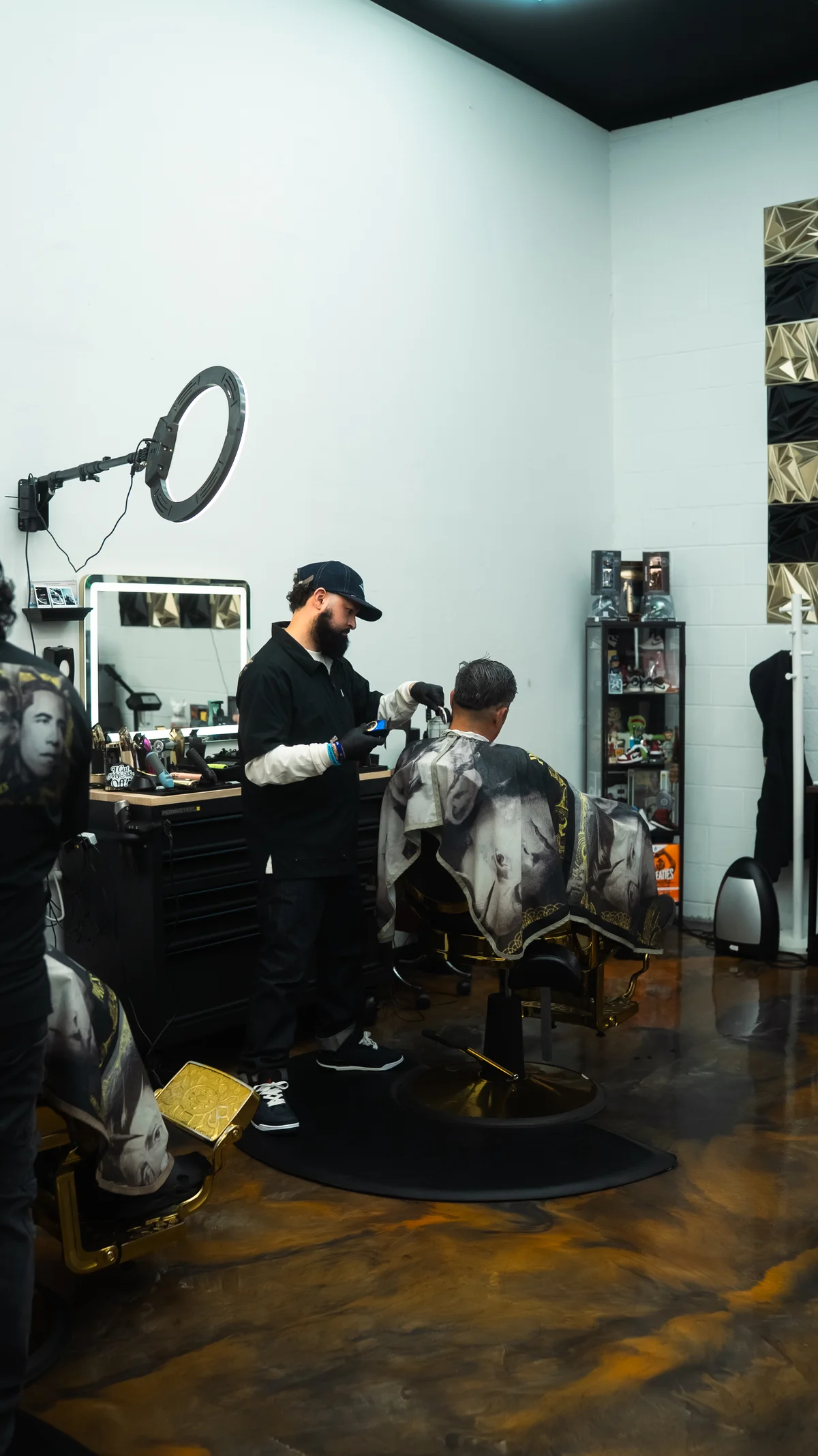 Julio giving a precision fade at Presidential Fades